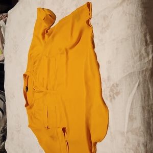 Torrid mustard 4X blouse with button flod up sleeves.